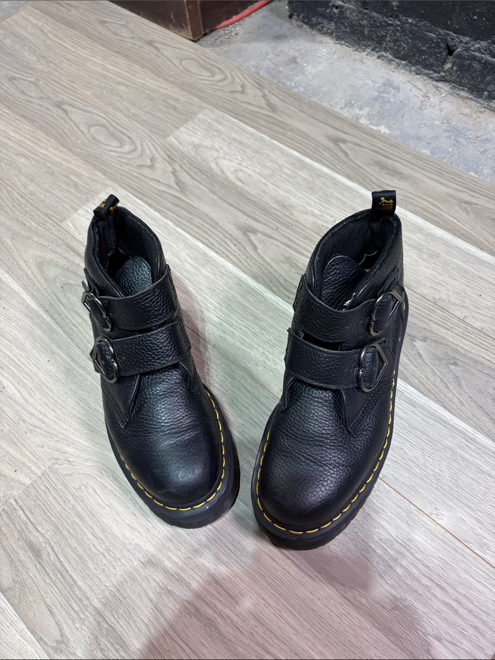 Dr. Martens Black Leather Double-Buckle Ankle Boots with Yellow Stitching